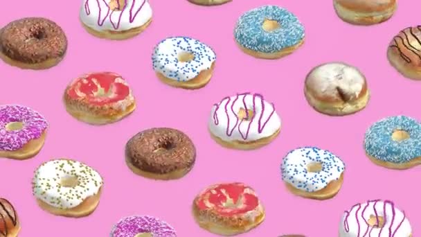 Verschillende donuts op een roze achtergrond - Video