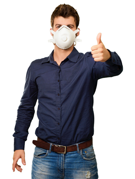 Young Man Gesturing And Wearing Mask - Foto, Imagen