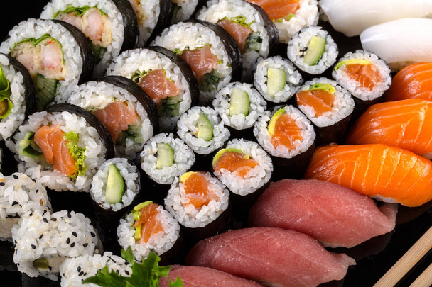 sushi on the black background - Photo, Image