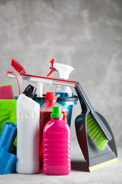 Cleaning supplies on grey background - Photo, Image