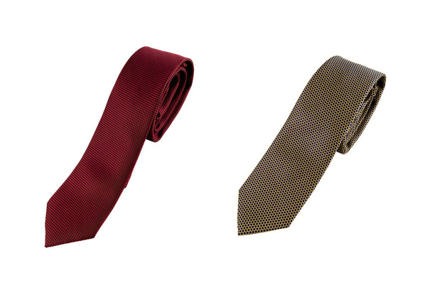 Два галстука - в красной маленькой клетке и серый в черном горохе на белом фоне
. - Фото, изображение