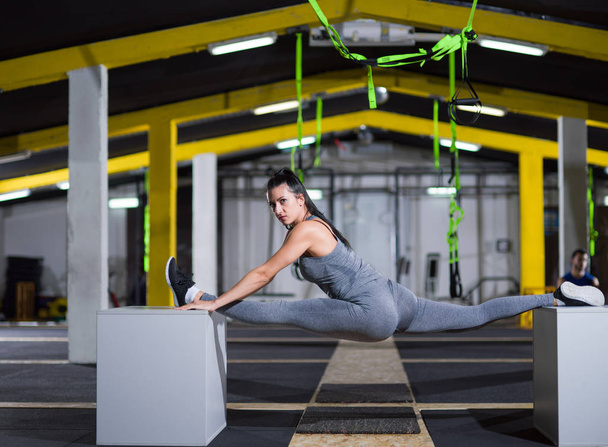 woman working out gymnastic exercise on fit boxes - Foto, Bild