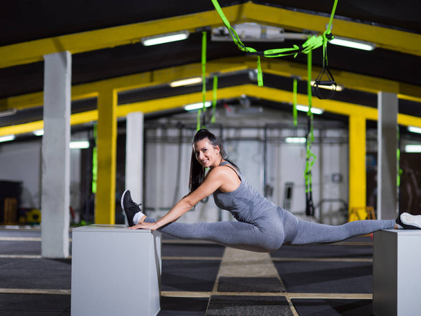 woman working out gymnastic exercise on fit boxes - Photo, Image