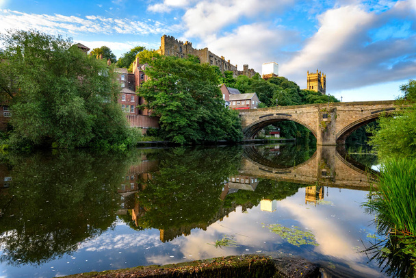 The Wear flows past Durham Castle and Cathedral, beneath Framwellgate Bridge and over a weir. - Photo, Image