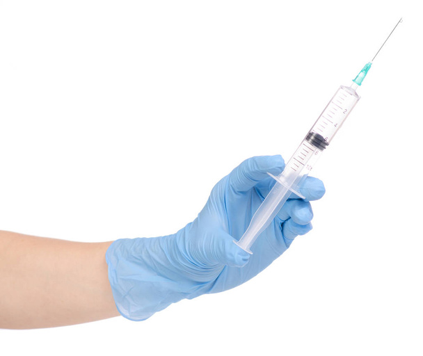Syringe in hand medical glove medicine - Фото, изображение
