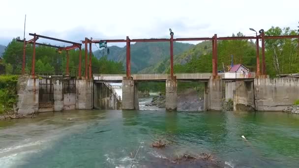 Aerial view of Chemal hydroelectric station located on the Chemal River in the Republic of Altai, Russia - Footage, Video
