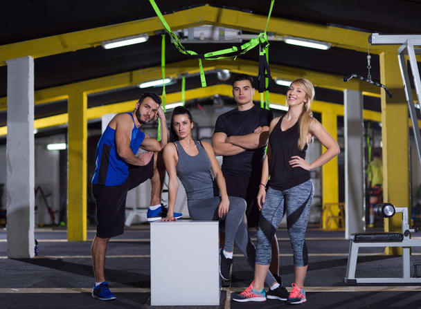 portrait of athletes working out  jumping on fit box - Foto, immagini
