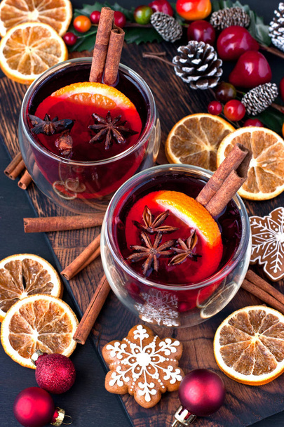 Christmas hot drink in glass and gingerbread cookies - Photo, image