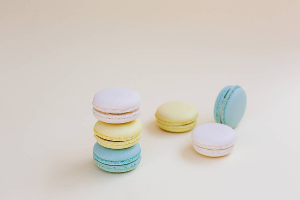 Macaroons on a yellow background.  - Photo, image