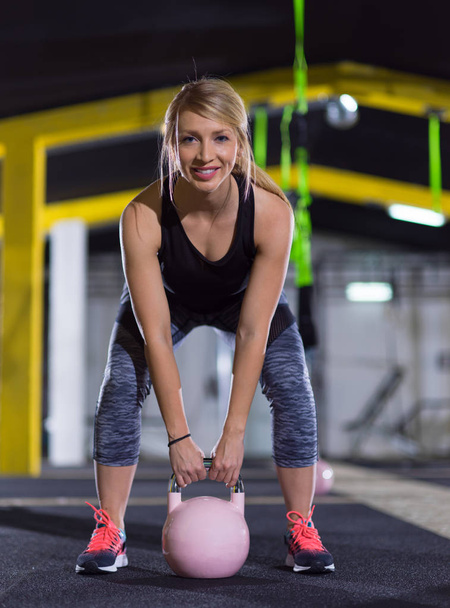 woman exercise with fitness kettlebell - Foto, Imagem