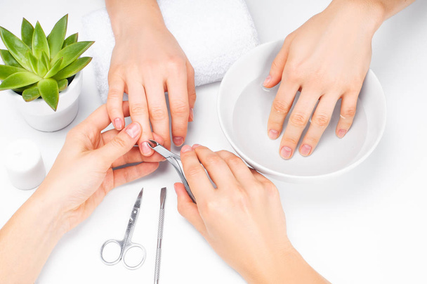 Hands care in the spa. Beautiful woman's hands with perfect manicure - Φωτογραφία, εικόνα