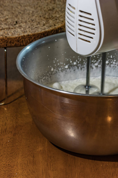 mixer whipping cream in bowl - Photo, Image