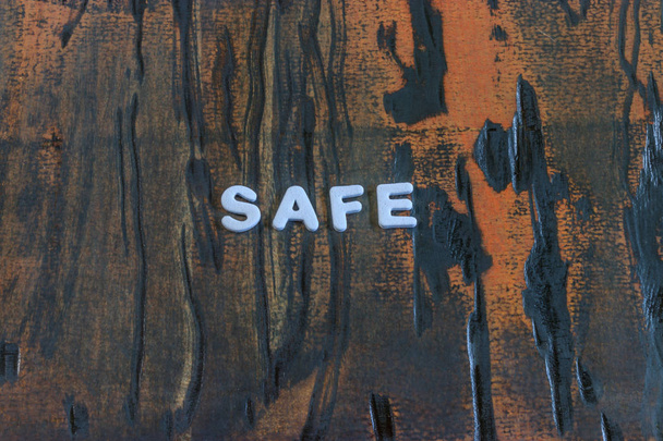 the word safe written in white block letters - Photo, Image