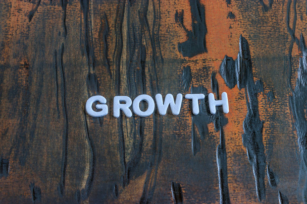 the word growth written in white block letters - Photo, Image