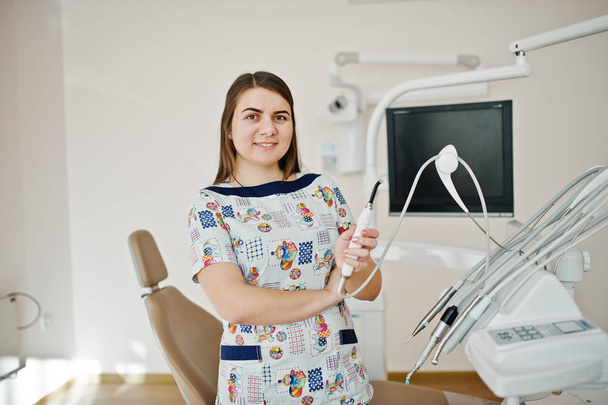 Portrait of baby dentist female at her dental office. - Fotoğraf, Görsel