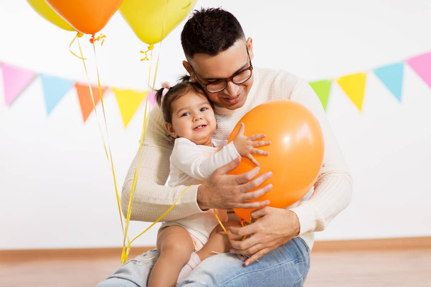 father and daughter with birthday party balloons - Fotoğraf, Görsel