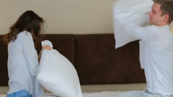 couple pillow fight fun joy leisure love emotion - 映像、動画