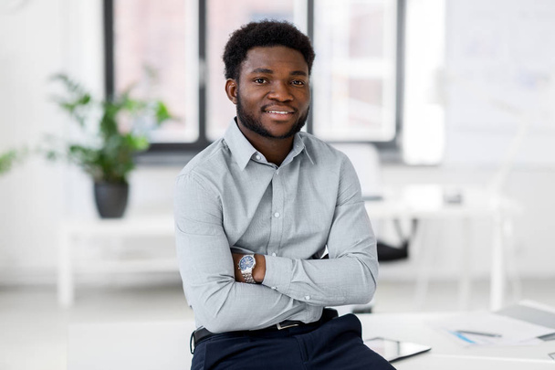smiling african american businessman at office - Valokuva, kuva