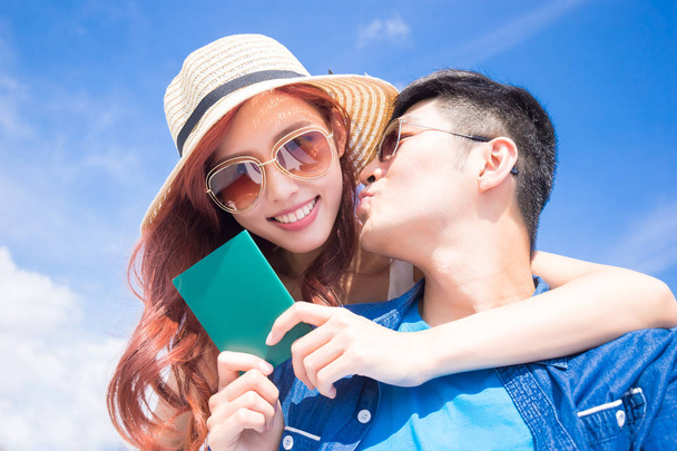 couple take passport with the blue sky - Foto, immagini