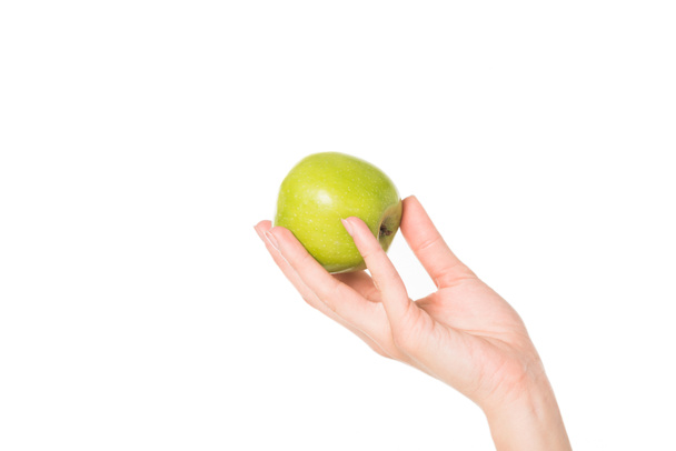 rajattu laukaus nainen tilalla vihreä omena eristetty valkoisella pohjalla
  - Valokuva, kuva