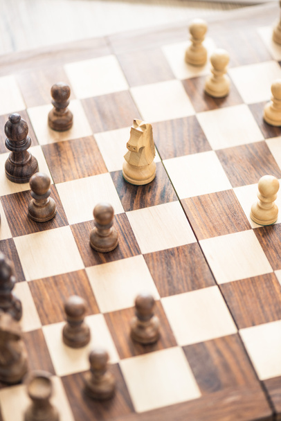 close-up view of wooden chess board with chess board - Photo, Image