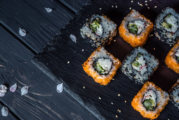 sushi on a black background 2 - Фото, изображение