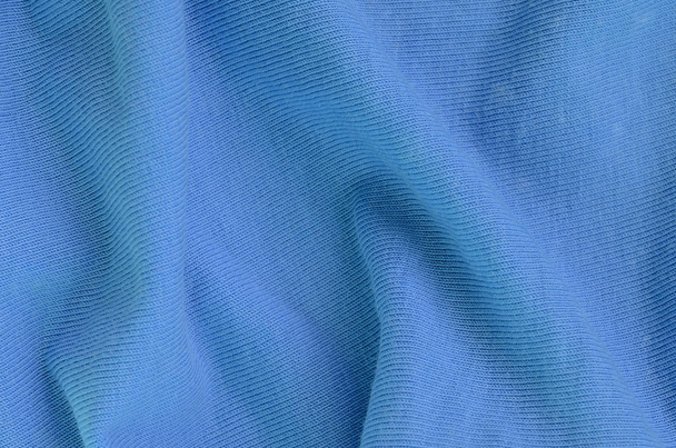The texture of the fabric in blue color. Material for making shirts and blouses - Foto, Bild