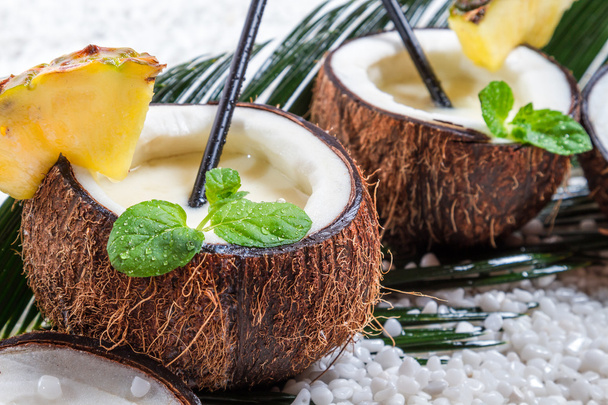 Closeup of pinacolada drink in the fresh coconut - Photo, Image