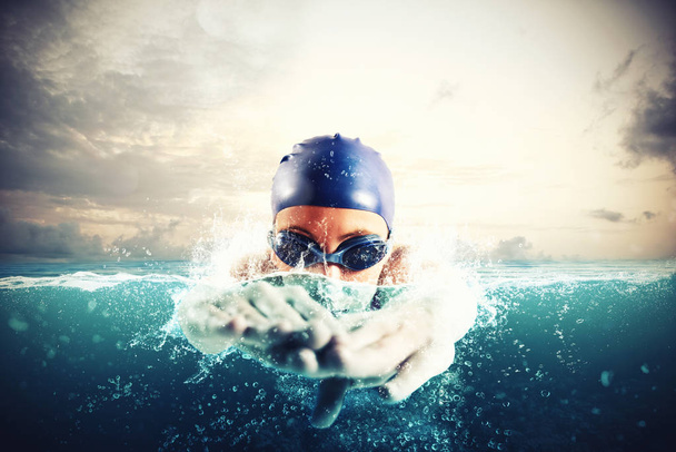 Αθλητή που κολυμπά σε ένα μπλε βαθιά νερά - Φωτογραφία, εικόνα