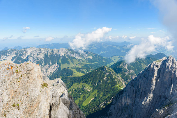 Hiker at Ellmauer Halt, Wilder Kaiser mountains of Austria - close to Gruttenhuette, Going, Tyrol, Austria - Hiking in the Alps of Europe - Foto, imagen