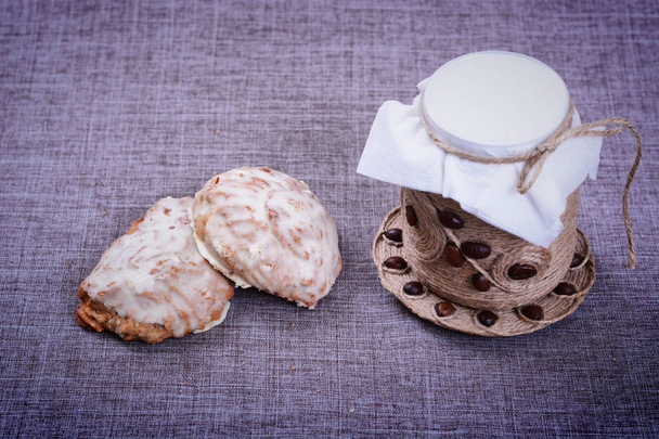 Sweet biscuits lying next to the decorative Cup - Фото, зображення