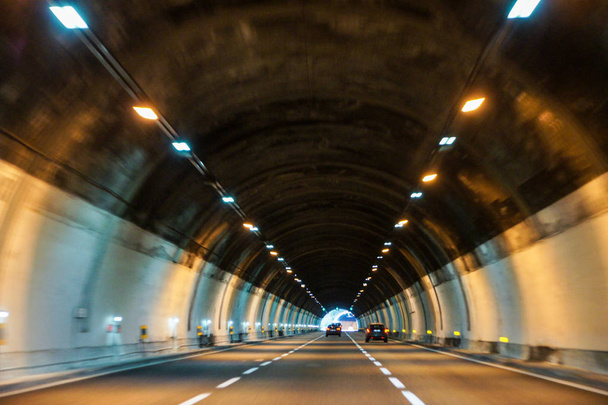 Cars in the tunnel. - 写真・画像