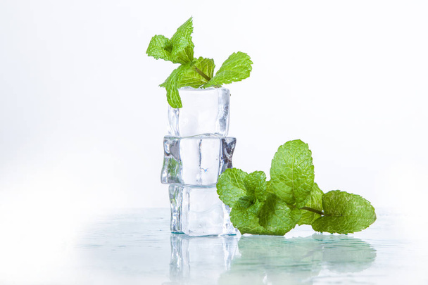 ice cubes and mint leaves isolated on a white background - Zdjęcie, obraz