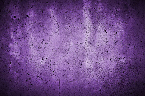 cracked concrete wall with fine fissures background texture, colored purple - Photo, Image