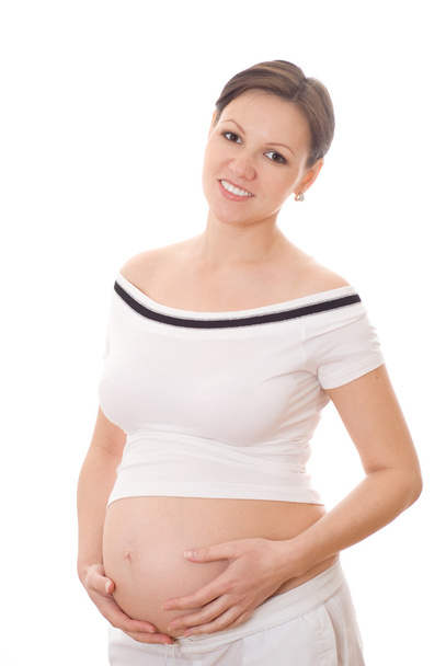 Happy pregnant woman standing - Foto, Bild