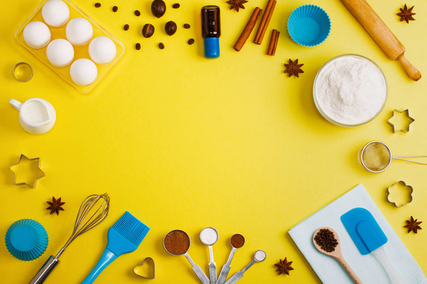 Baking background eggs flour milk spices kitchen tools - Фото, изображение