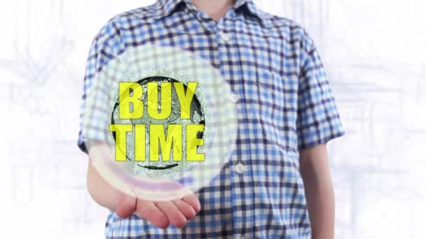 若い男が地球とテキスト購入する時間のホログラムを示しています - 映像、動画