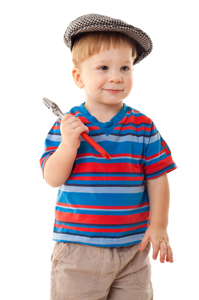 Little boy in cap with wrench - Φωτογραφία, εικόνα