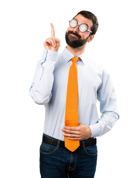 Funny man with glasses pointing up - Foto, imagen
