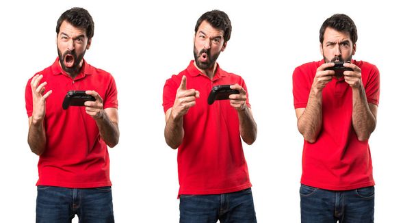 Set of Handsome young man shouting and playing videogames - Photo, Image