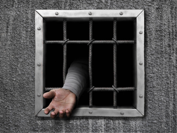 Hand of prisoner in jail - Photo, Image