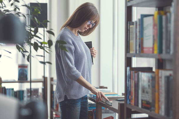 Attractive woman with books - Photo, Image