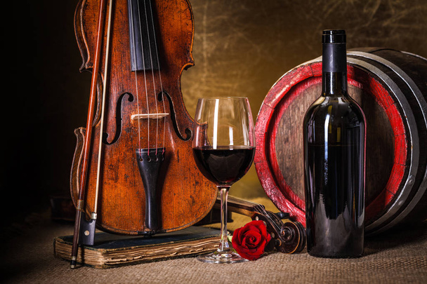 Red wine in glass, barell and violin - Zdjęcie, obraz