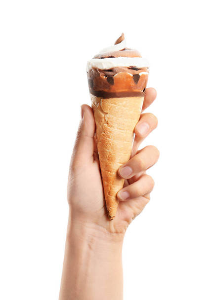 Woman holding yummy ice cream on white background. Focus on hand - Fotografie, Obrázek