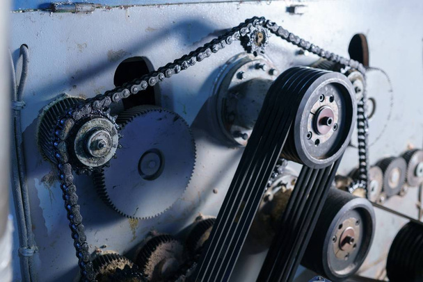 Image of chain stretched over gears on machine - Photo, Image