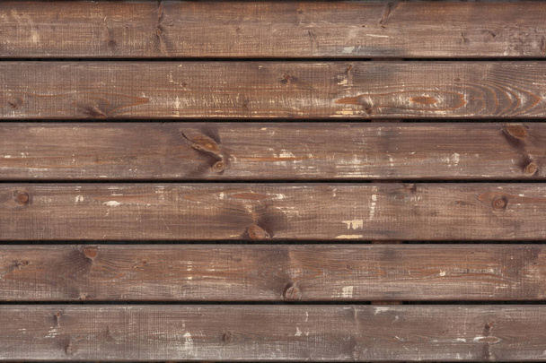 Ξύλινο καφέ γδαρμένο ξύλινες σανίδες ως φόντο ή φόντο - Φωτογραφία, εικόνα
