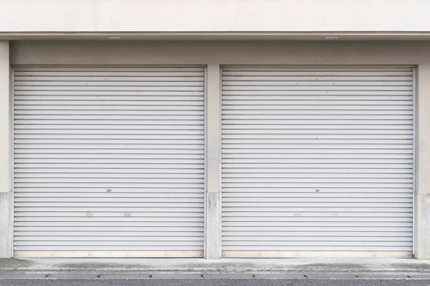 Closed white roller shutter door  - Photo, Image