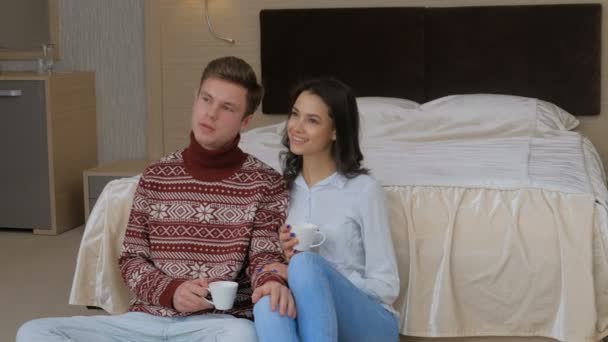 comfy couple leisure drinking bedroom talking - Filmati, video