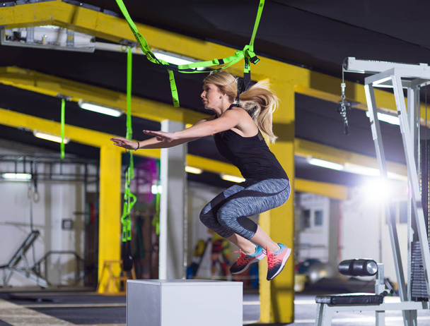 woman working out  jumping on fit box - Fotoğraf, Görsel
