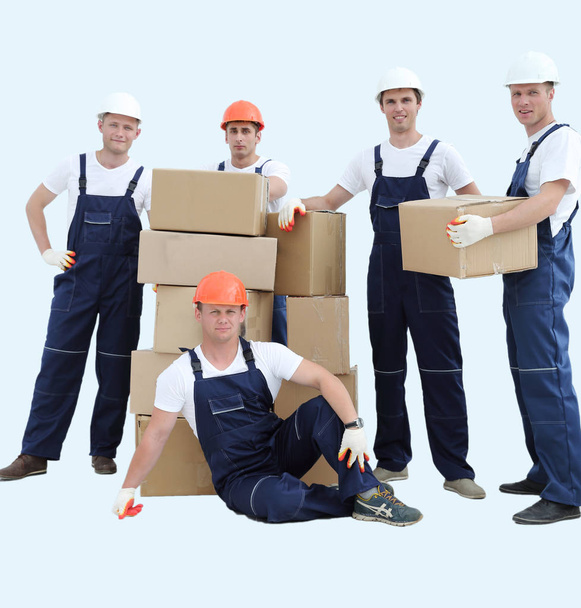 Group of people builders with boxes - Foto, Imagen